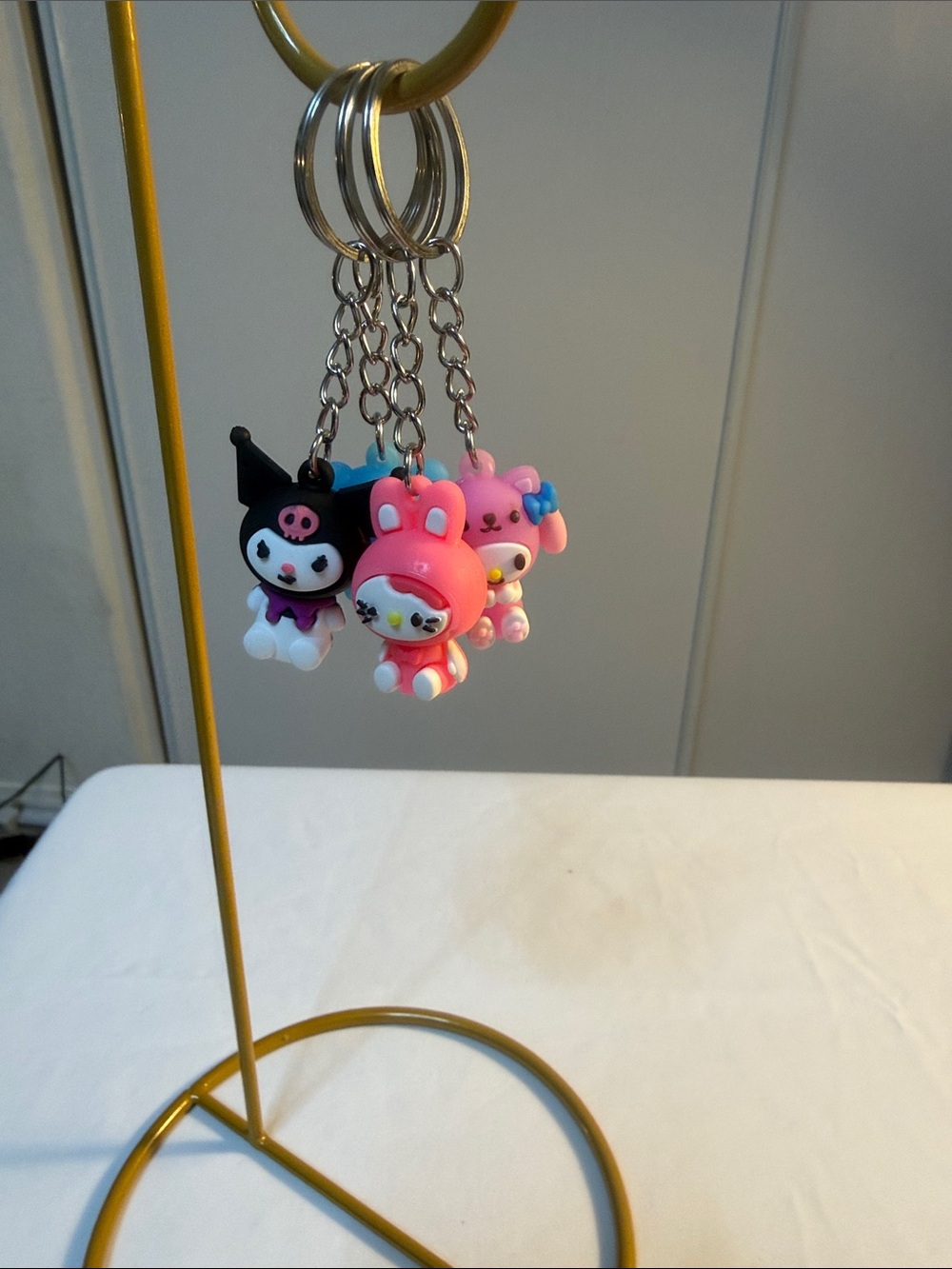 Sanrio Keychain Trio with Pink, Black, Blue Accents